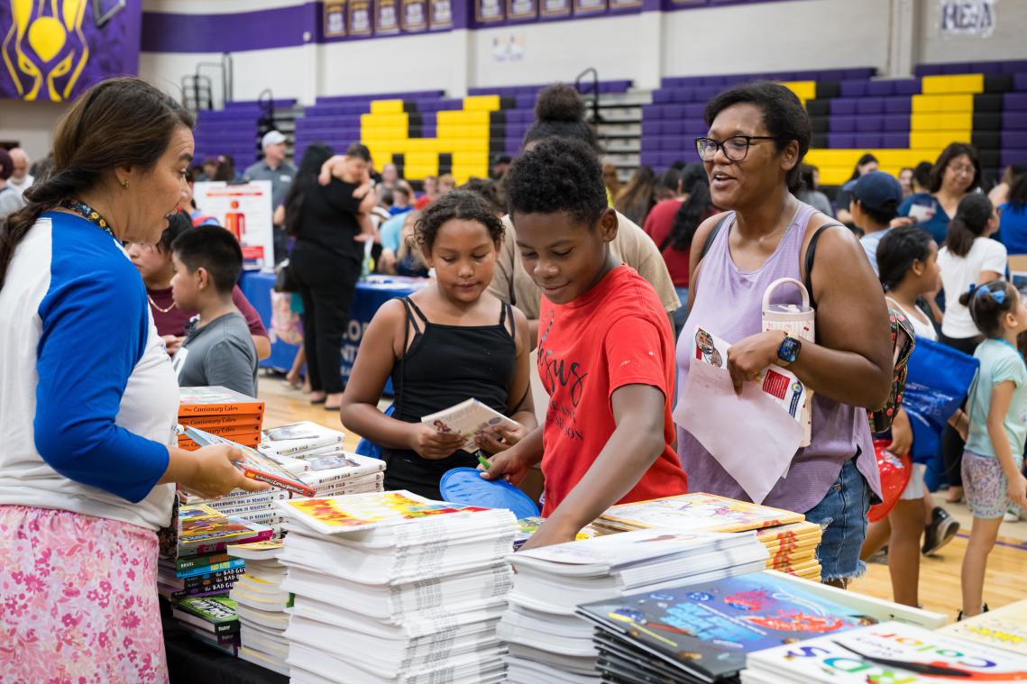Backpacks, Haircuts, and 1,919 Reasons to Show Up: Klaus Team at Mesa’s 6th Annual Back-to-School Event